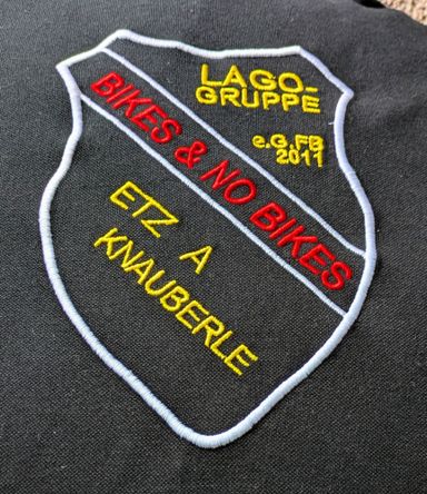 schwarze Poloshirts Lago-Gruppe